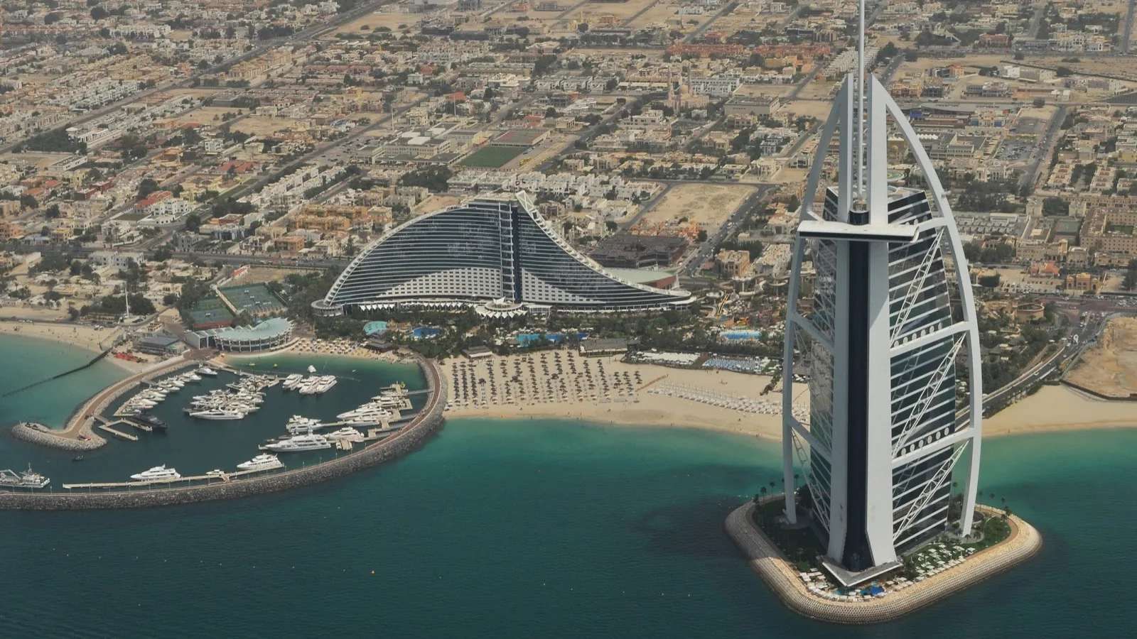 The Burj Al Arab and Dubai coastline representing opening a company in the UAE