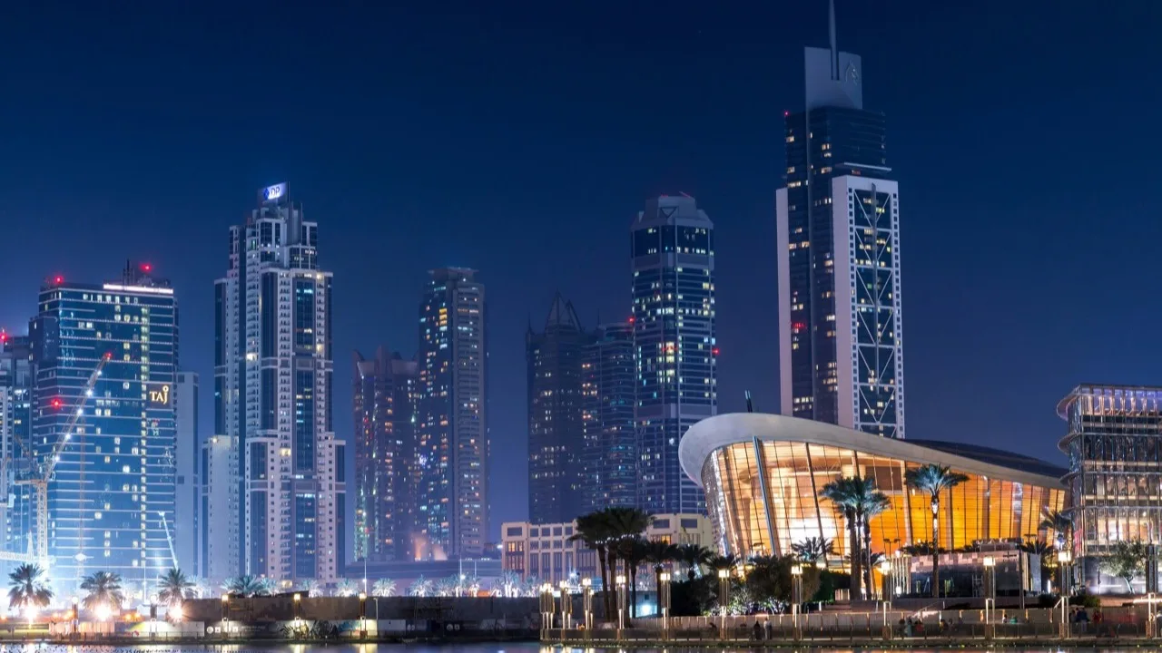 Dubai waterfront and high-rise buildings representing the real first-year cost of a company